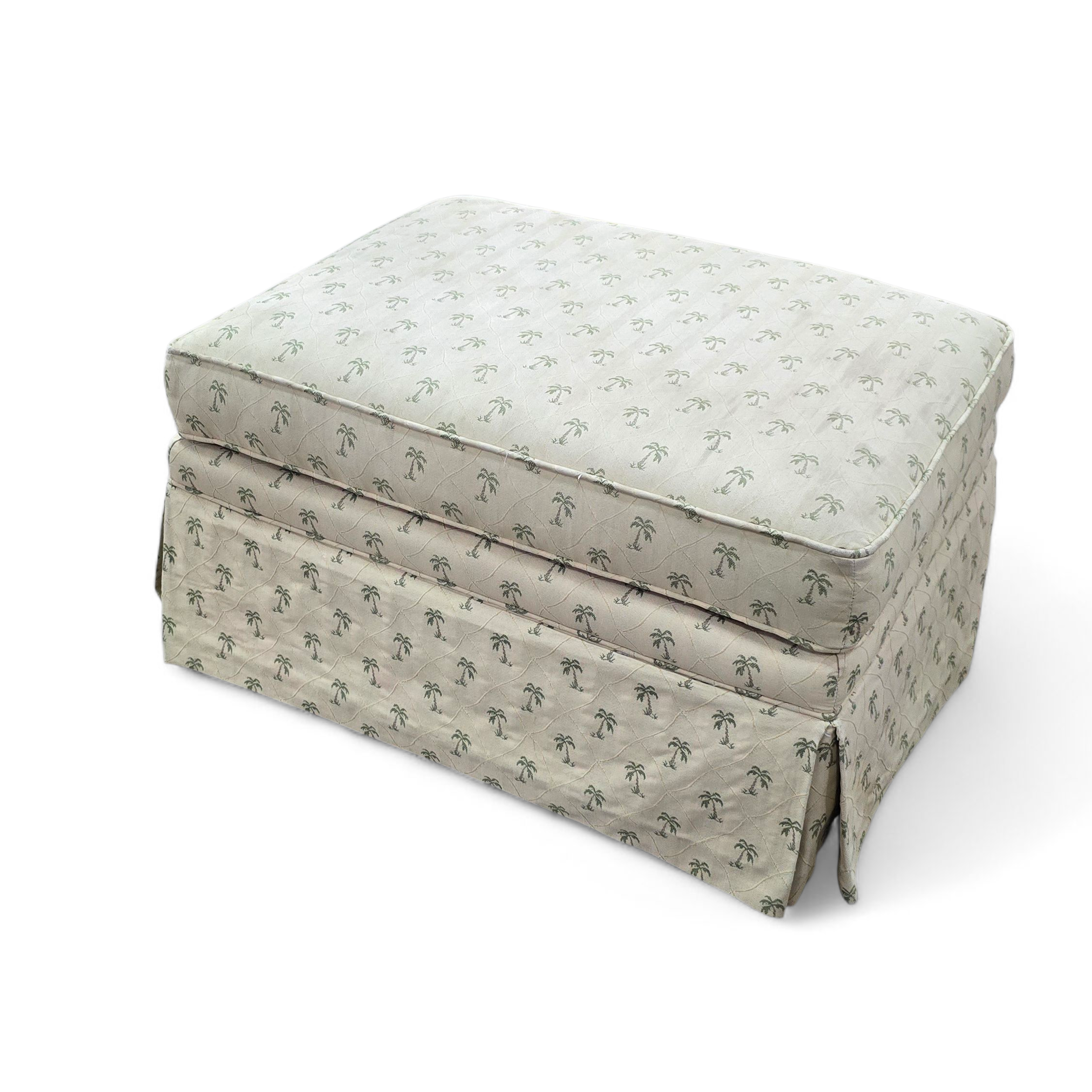 SHL 31x22.5 upholstered ottoman with palm tree pattern and skirted base front view, used and in good condition