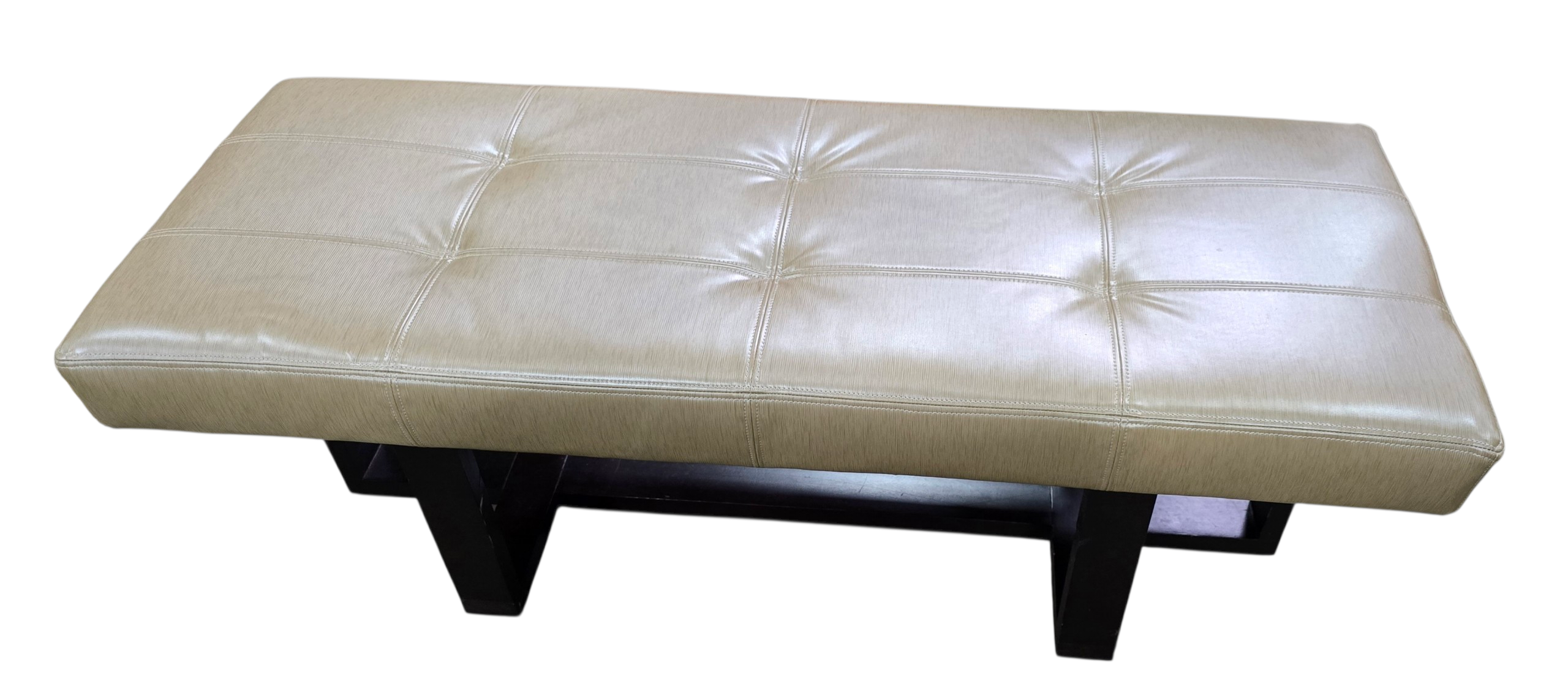 Close-up of cushioned bench seat surface