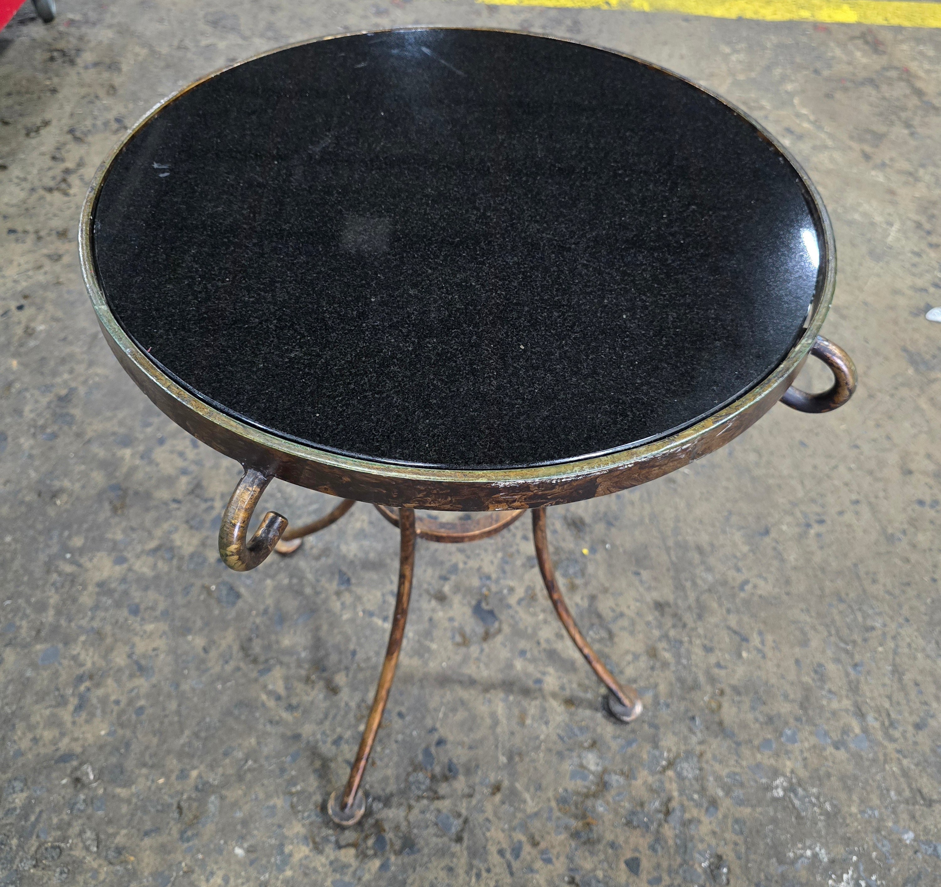 Close-up of black glass tabletop detail