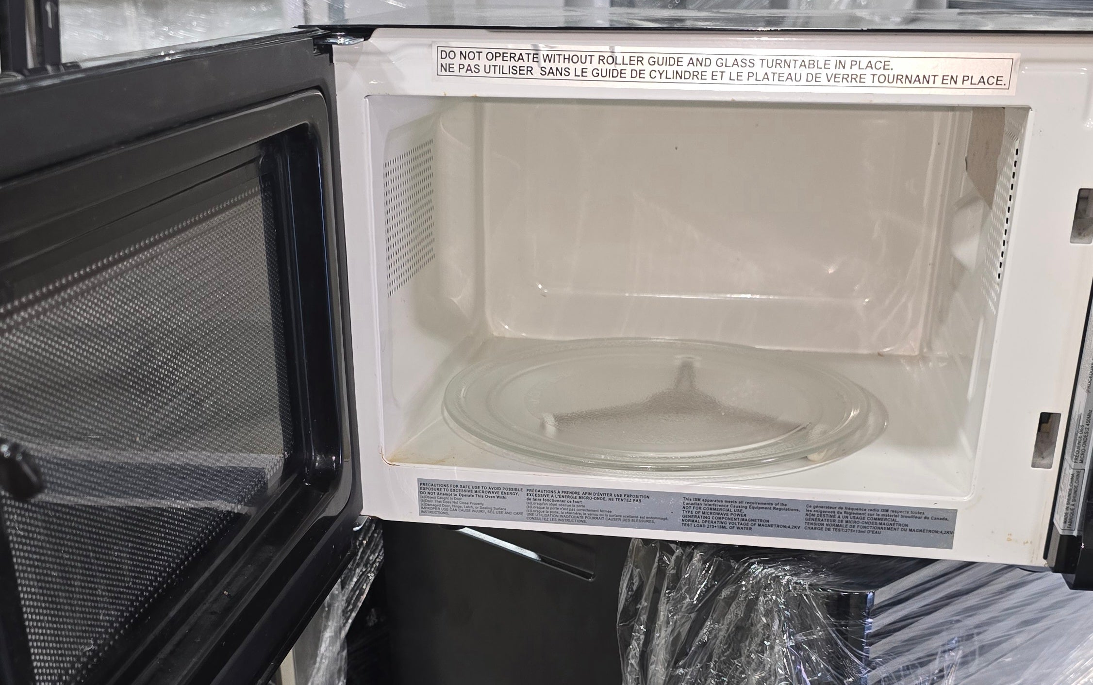 Black countertop microwave used in good condition