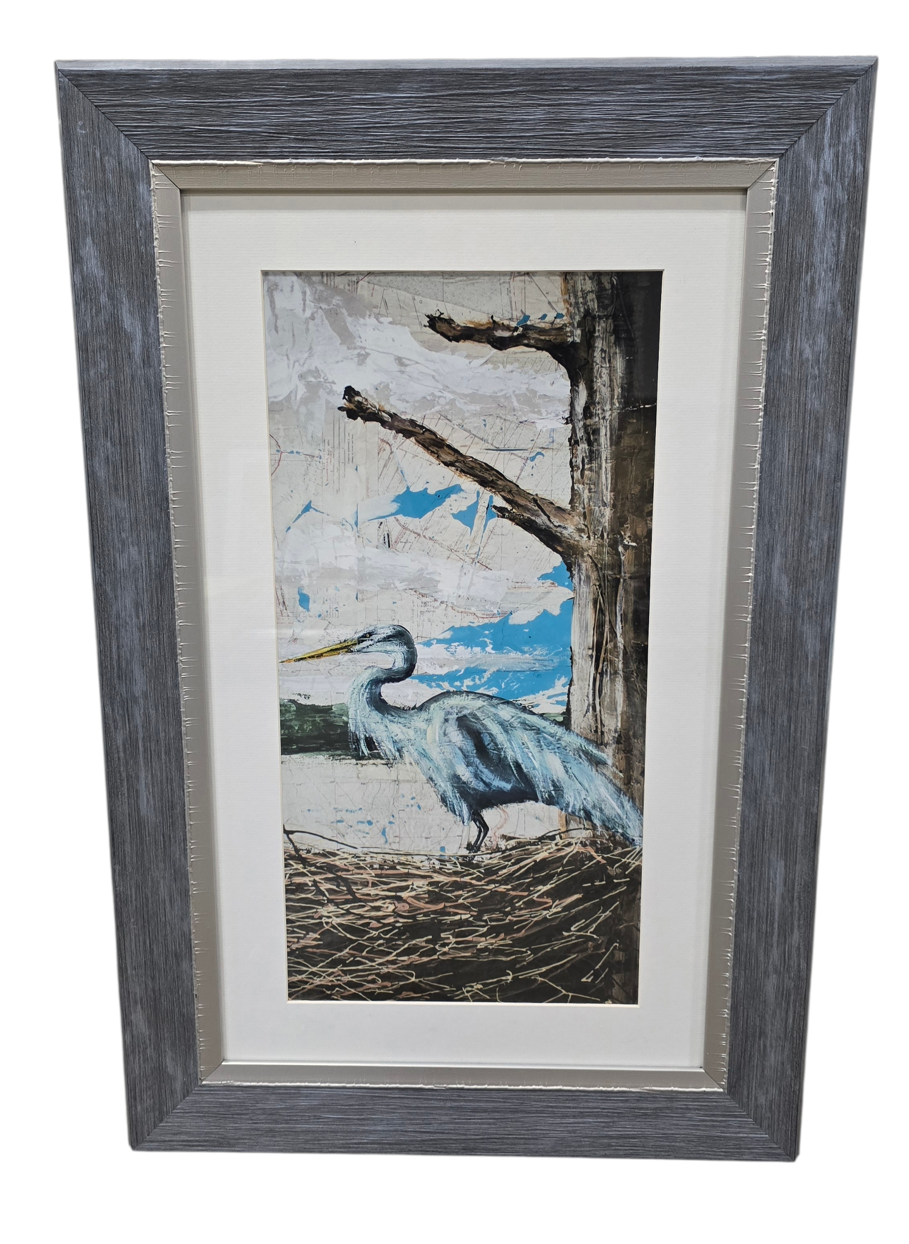 Framed wall art of blue heron standing in a large nest, used and in good condition