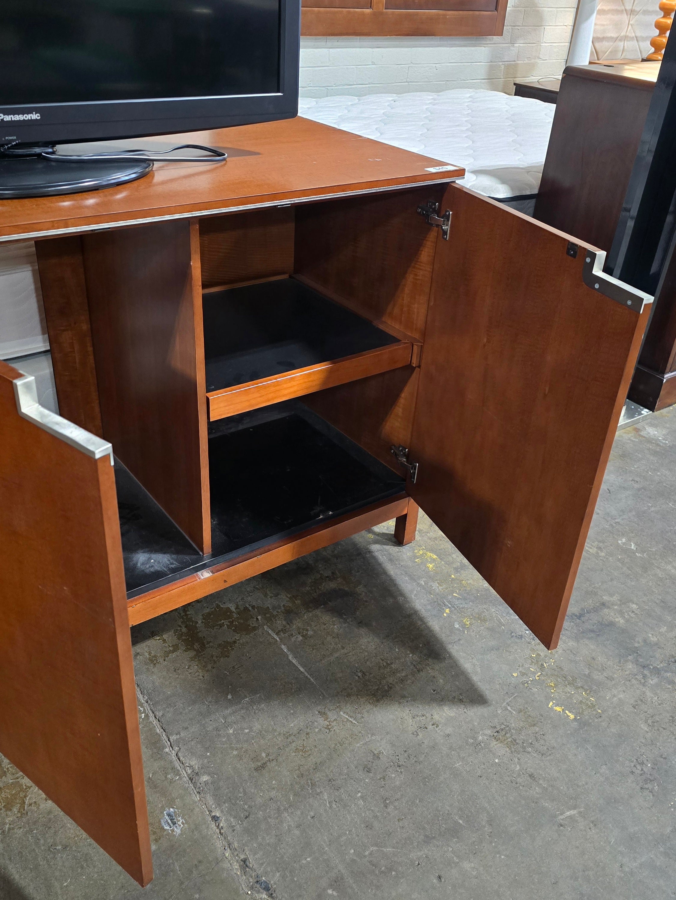 SHL angled view of Fairmont Designs TV dresser with sliding shelf