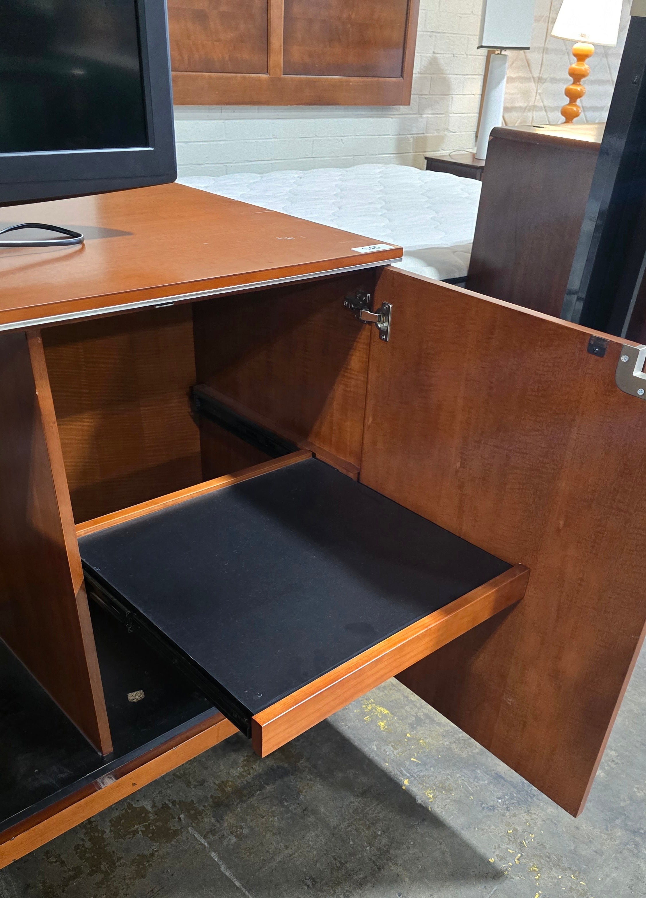 SHL open cabinet view showing sliding shelf in Fairmont Designs TV dresser