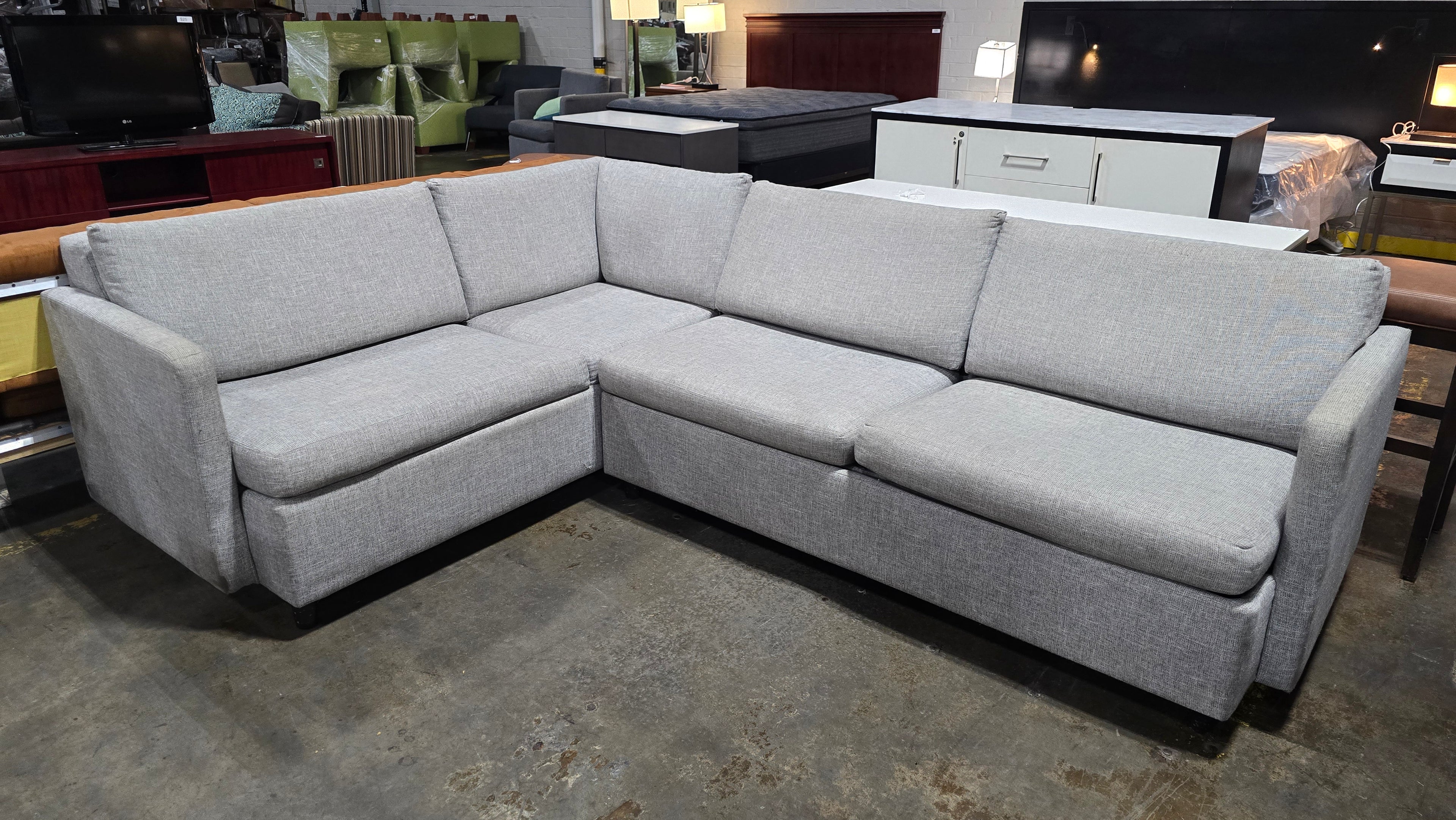 Front view of gray sectional sleeper sofa