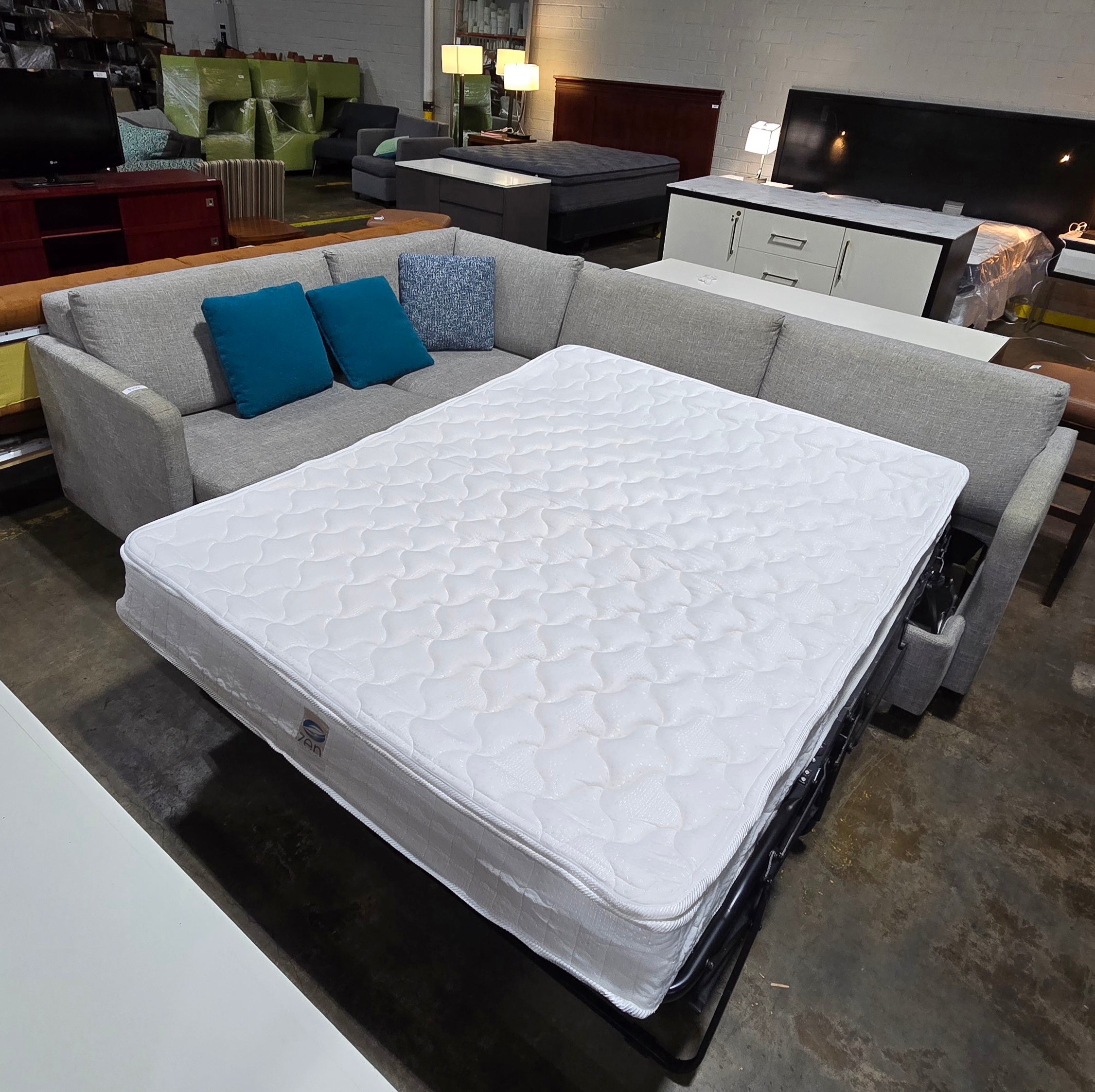 Gray sectional sofa sleeper used in good condition