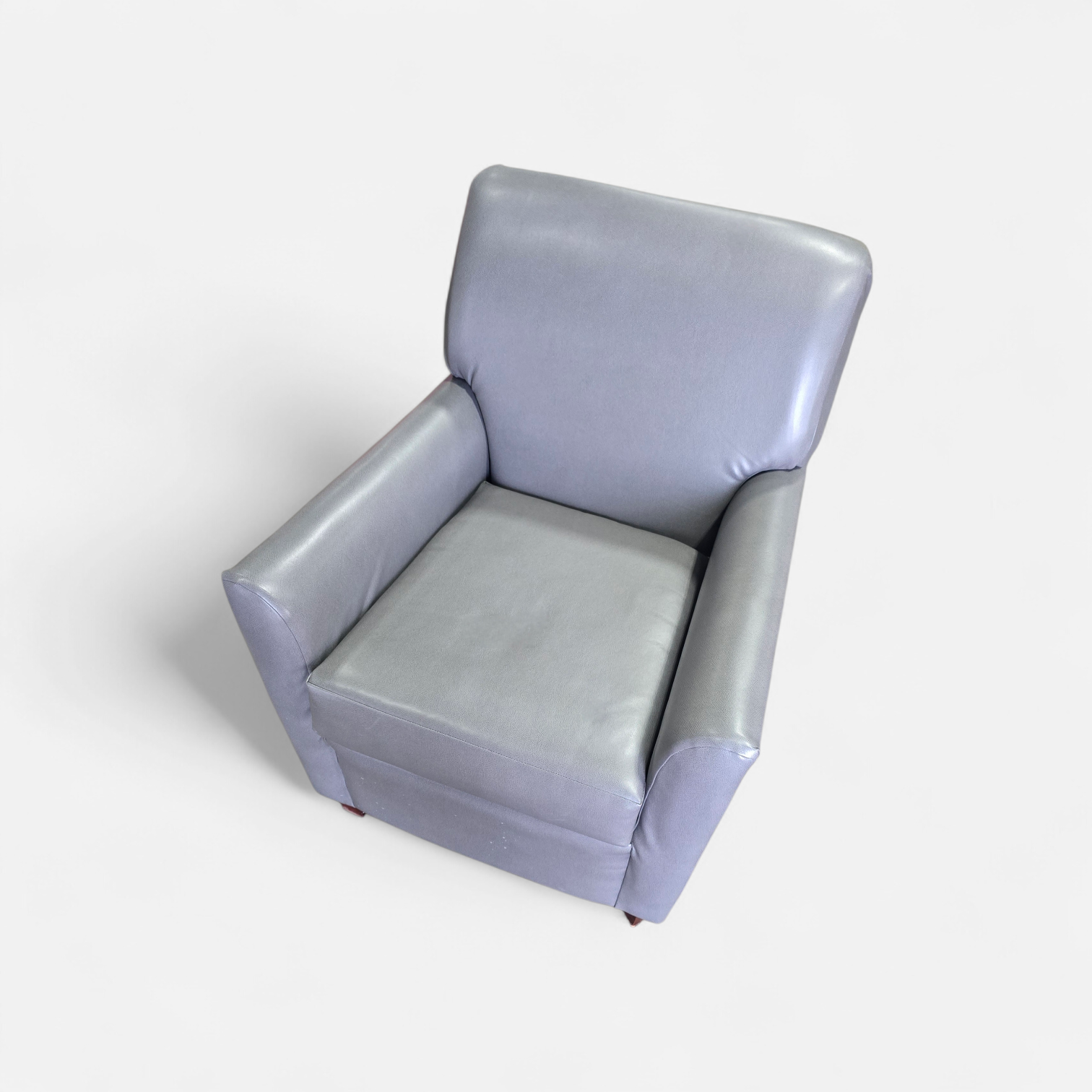 SHL angled view of gray vinyl arm chair for office or living room, used and in good condition