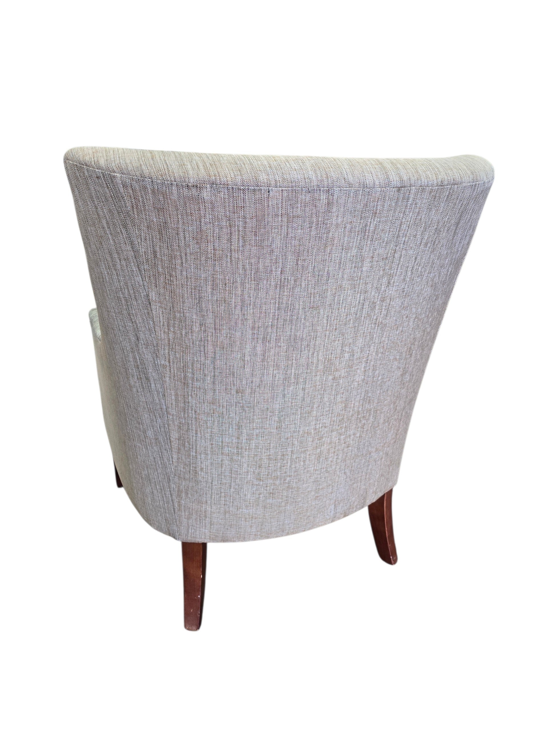 SHL used quality resort accent chair featuring a curved back, textured woven upholstery, and cherry finish wood legs