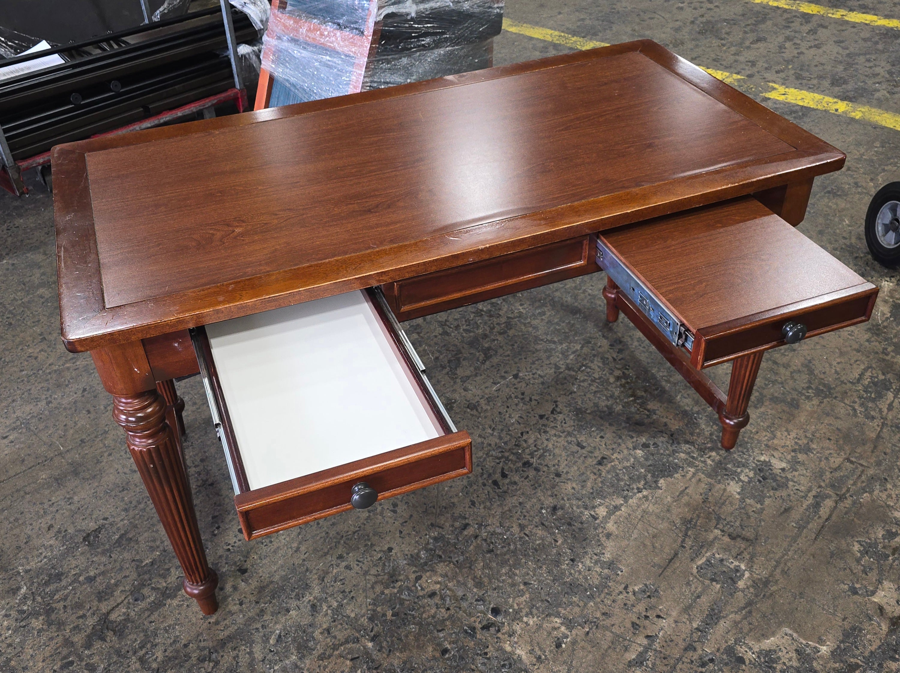 SHL used home office desk with keyboard tray and center pencil drawer in rich cherry finish