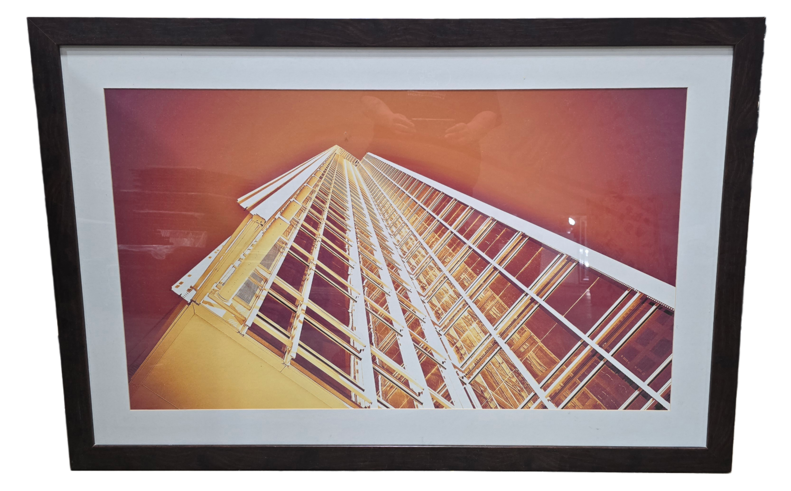 53.5 x 35.5 framed wall art of orange-lit skyscrapers in Midtown Atlanta, ground view looking upward, available at Southern Hospitality Liquidation in Cartersville GA