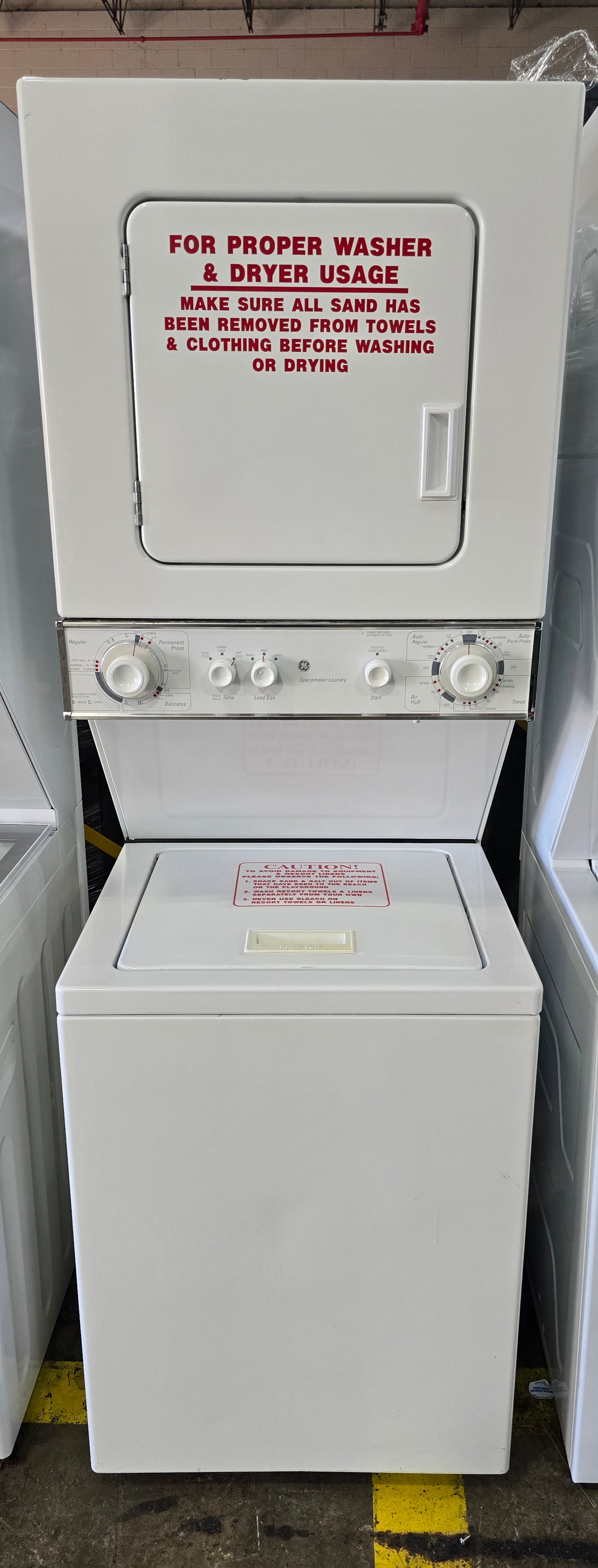 Front view of 2011 GE Spacemaker washer dryer unit, space-saving laundry appliance