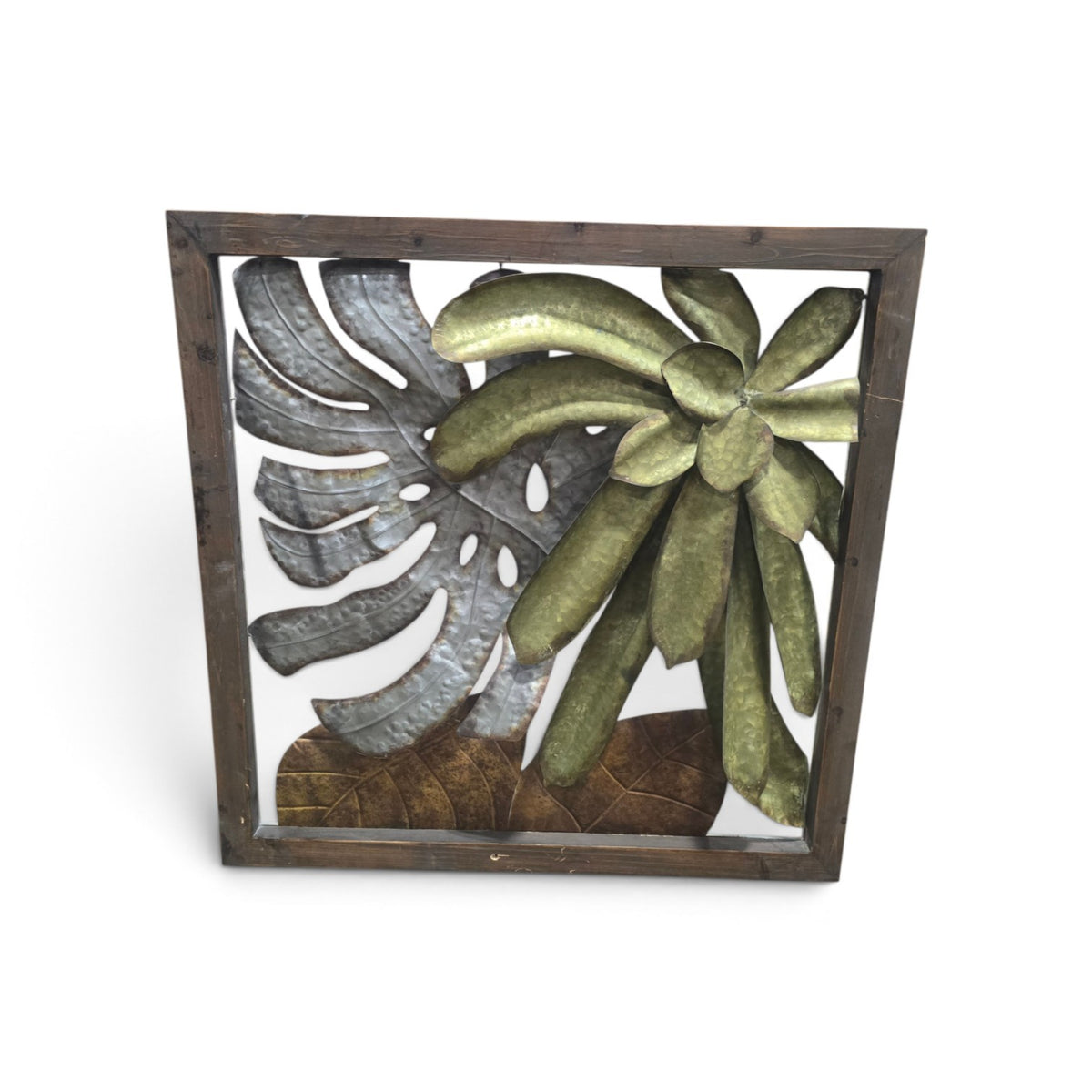 Framed metal tropical leaf and flower wall art with rustic wood frame