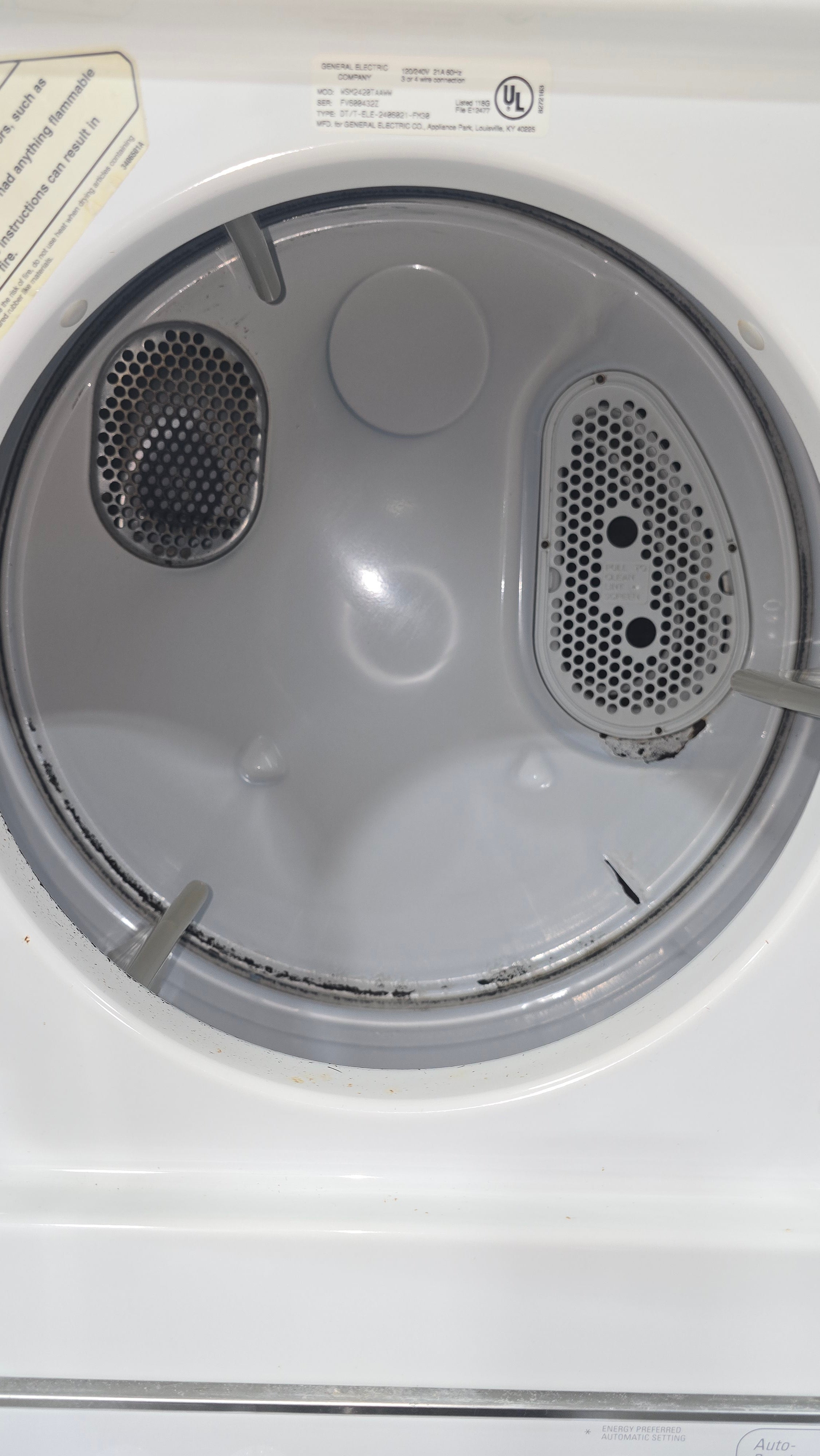 GE Spacemaker 24-inch stacked laundry center, used and in good condition from resort
