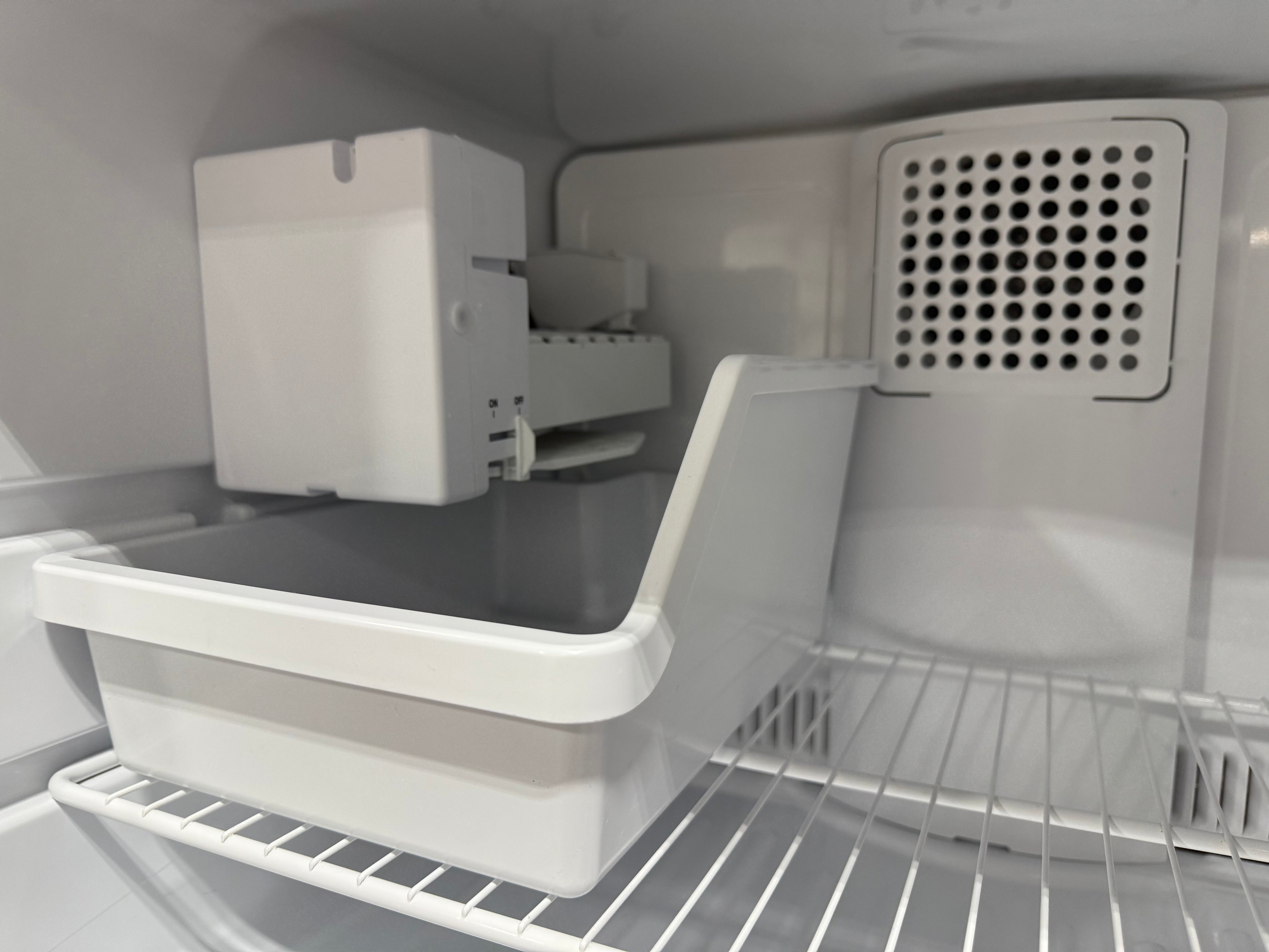 Freezer section of GE Energy Star 17.5 cu.ft. refrigerator sold by SHL
