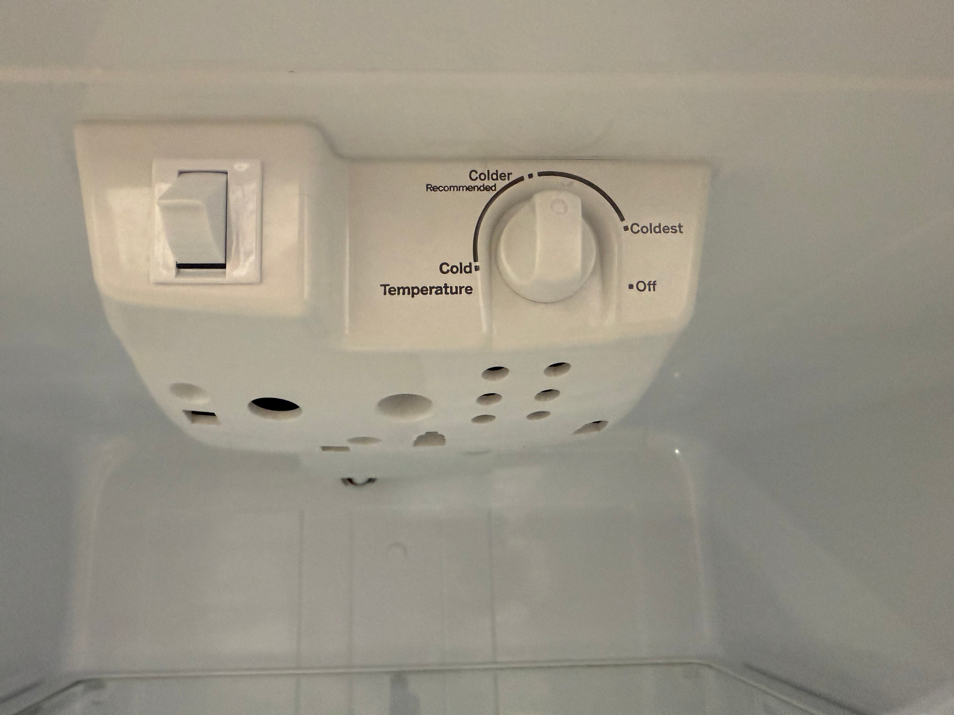 GE top freezer refrigerator door with storage bins and compartments from Southern Hospitality Liquidation