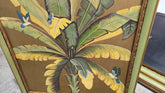 Angled view of tropical palm tree wall art in a 35 x 35 green frame, showing detail and texture of the artwork.