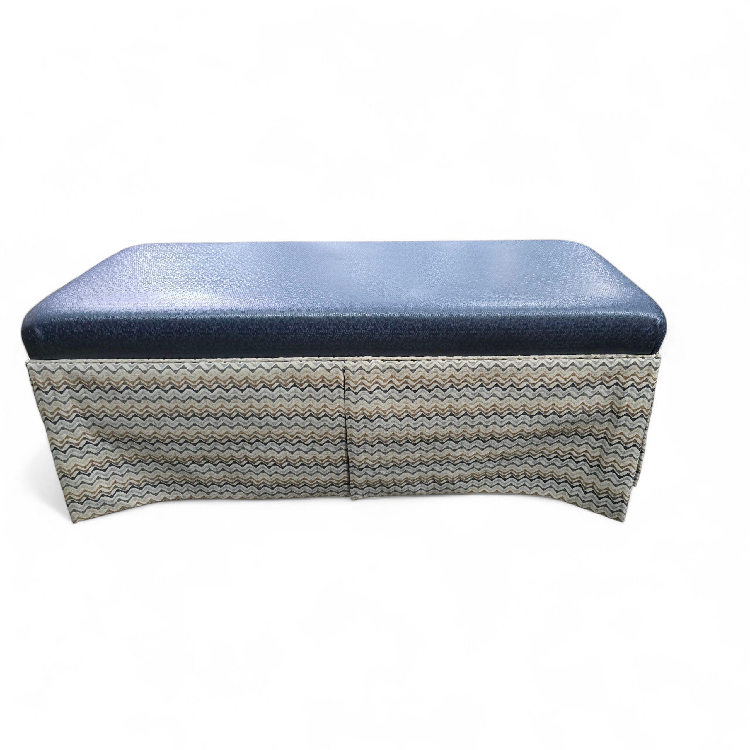 Upholstered Kellex bench with skirting, perfect for bedroom or seating area, used