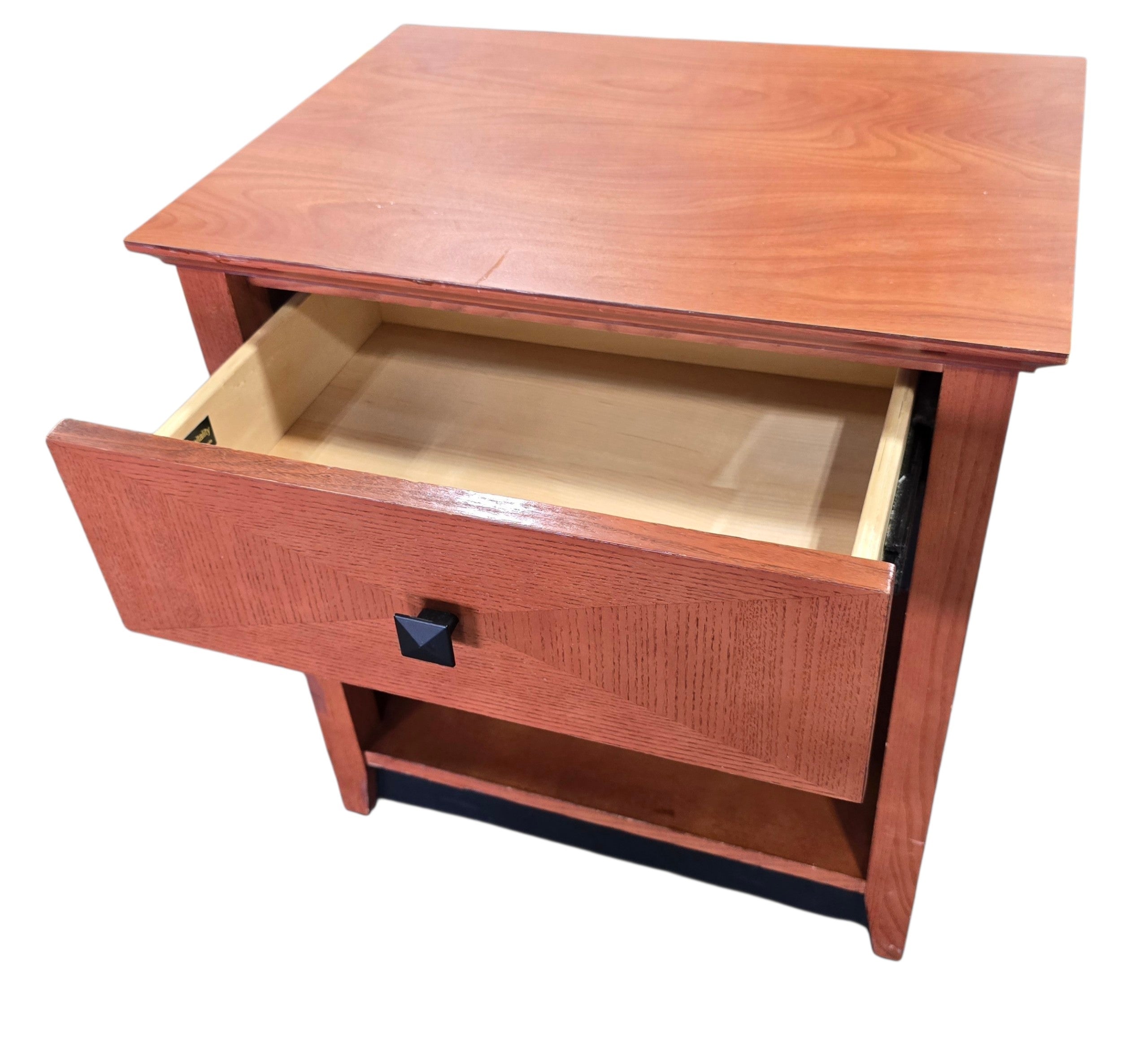Used Kimball Hospitality nightstand with drawer extended to show storage space, quality used resort furniture at Southern Hospitality Liquidation.
