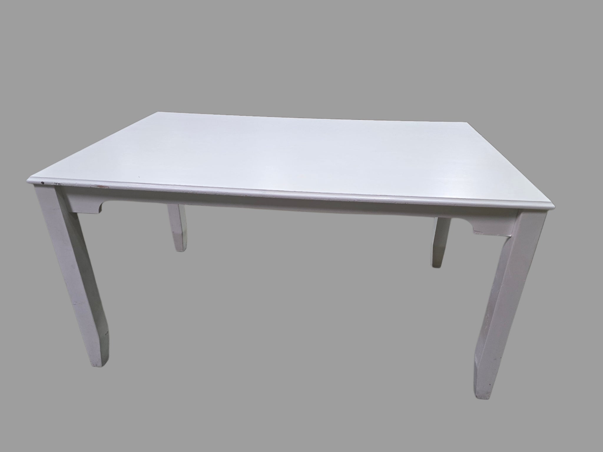 “Resort liquidated white wood dining table, 58 x 36 x 30, from Grand Palms Resort”
