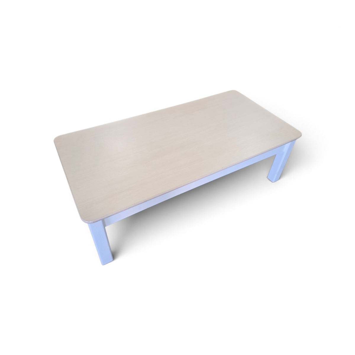Used white wood coffee table with beige laminate top, 48 inches wide, at Southern Hospitality Liquidation.