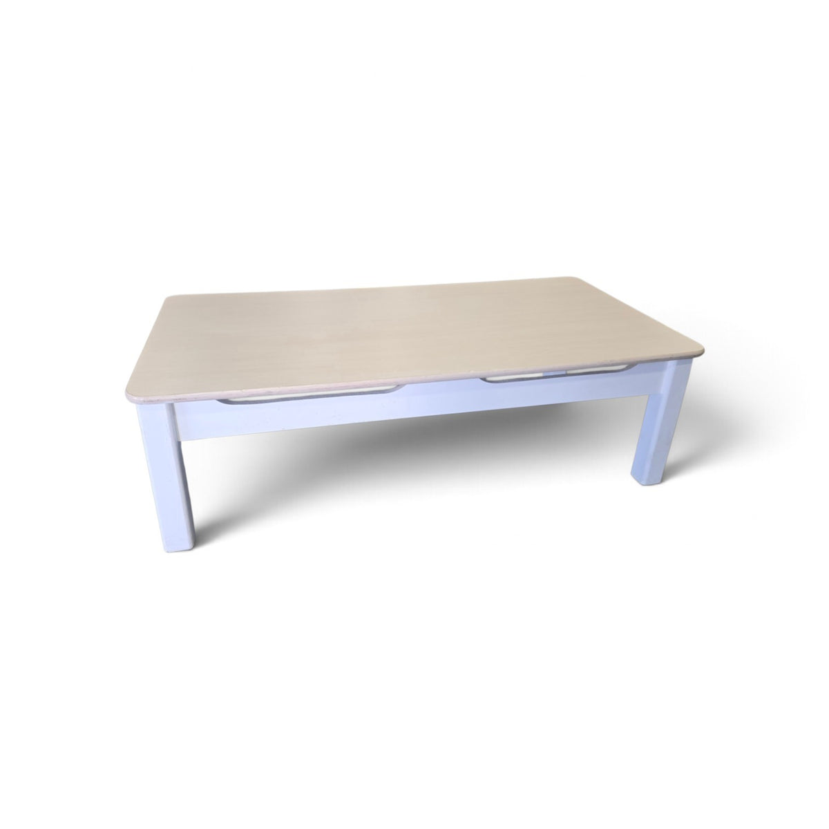 Used white wood coffee table with beige laminate top,front view, 48 inches wide, at Southern Hospitality Liquidation.