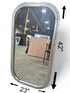 23" x 42" Industrial Silver Oval Mirror with Industrial details. Mirror is used and located in Cartersville Georgia. 