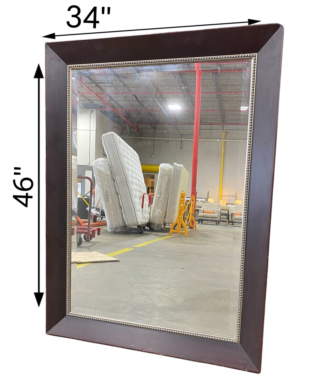 Brown wooden framed mirror used located in Cartersville Georgia