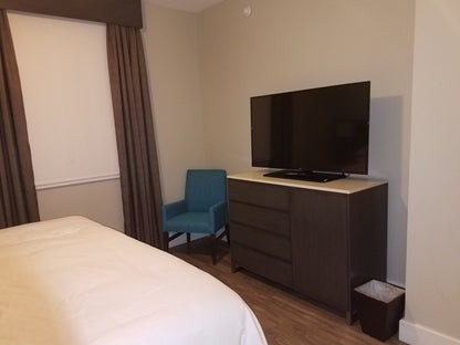 Hilton Grand Vacations hotel dresser with 4 drawers and cabinet – pre-owned hotel furniture liquidation package item