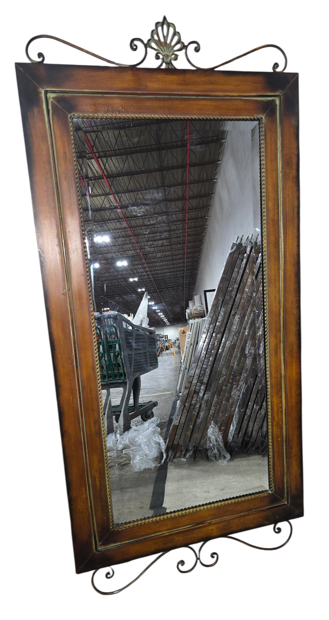 Full length mirror with ornate lightweight metal frame measuring 28 x 60 inches, used and in good condition