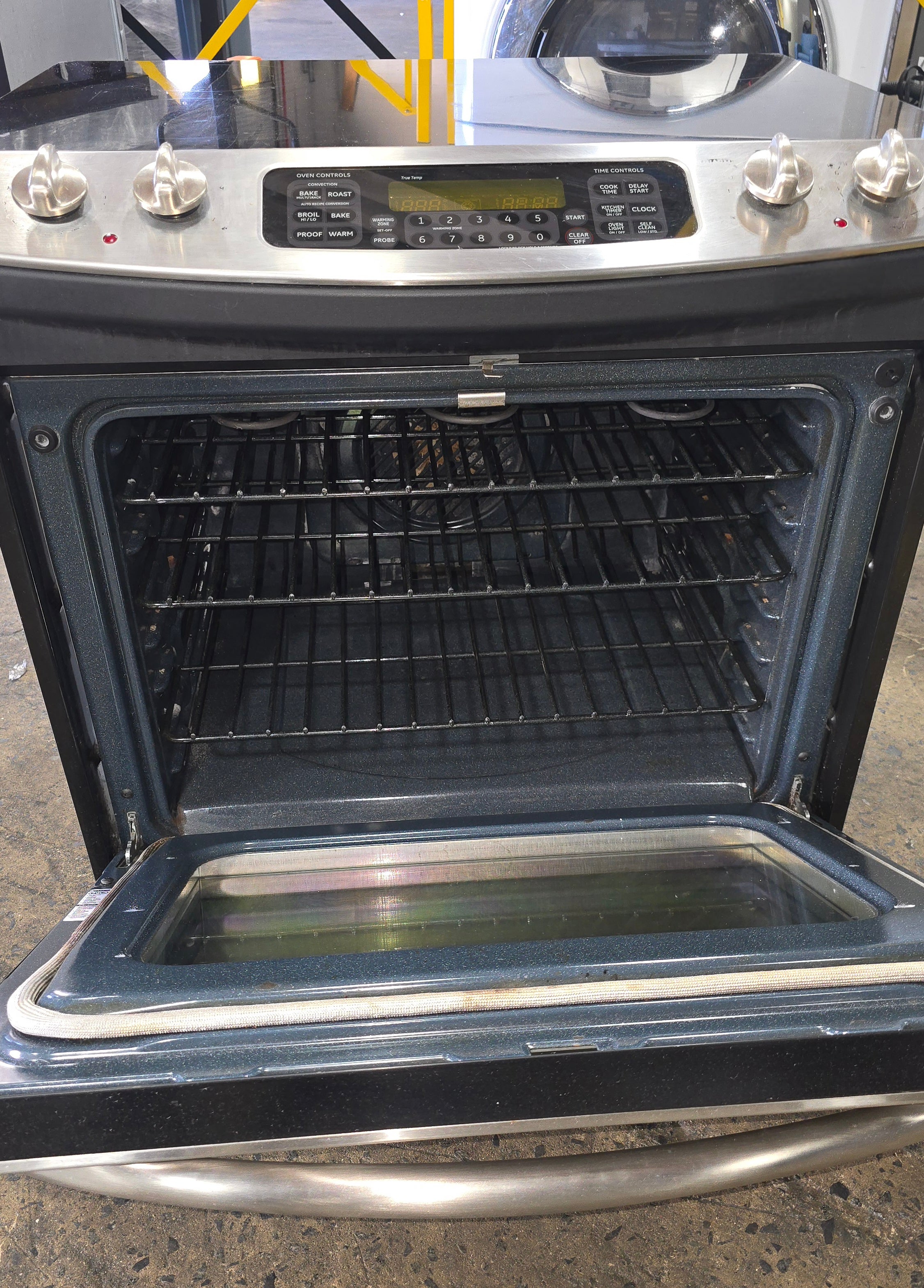 Close-up of GE Profile glass cooktop surface