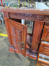 Cabinet storage detail suitable for mini fridge placement