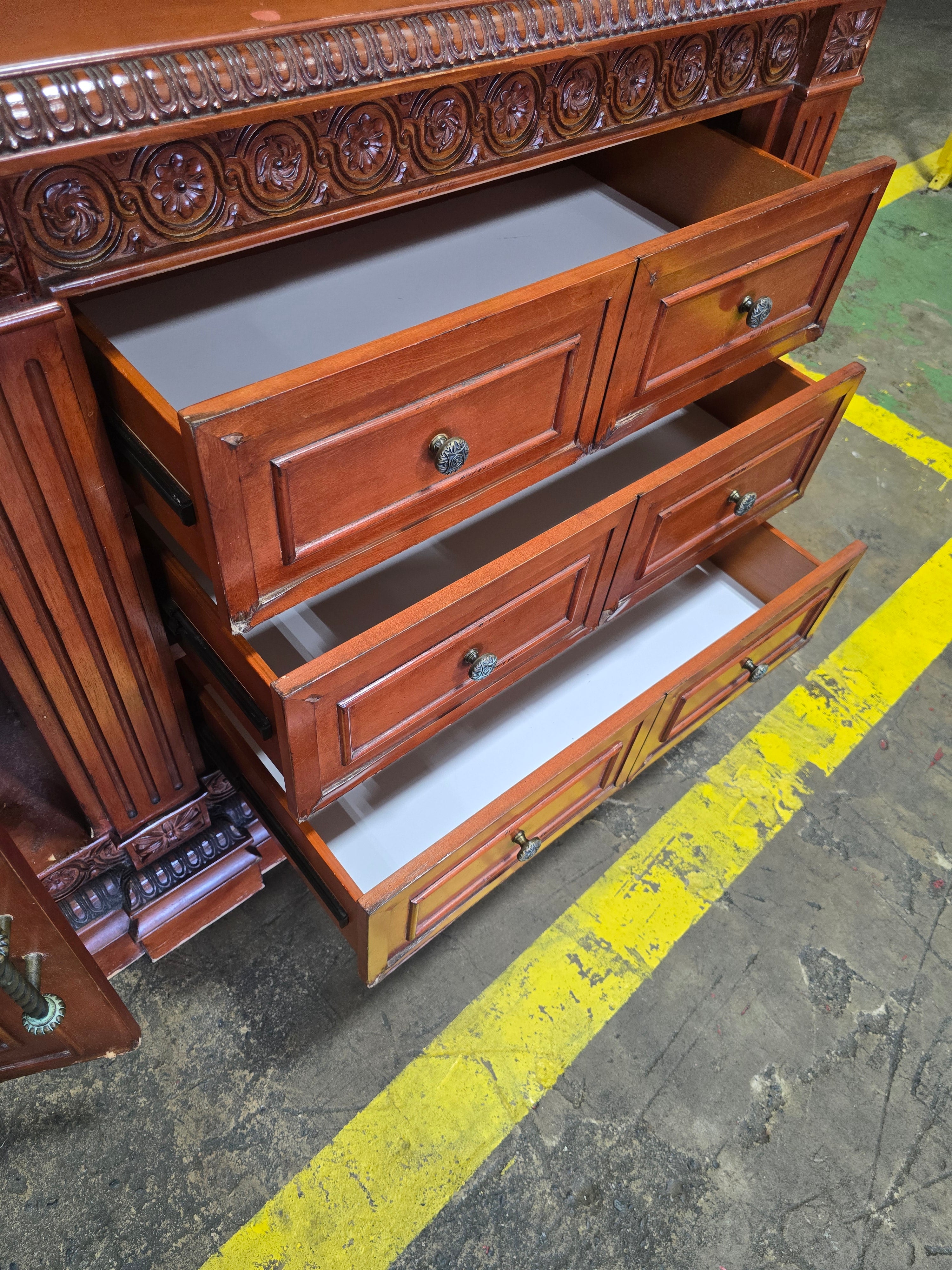 Close-up of drawer detail on TV dresser
