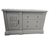 Front view of carved wood 3 drawer TV dresser with cabinet