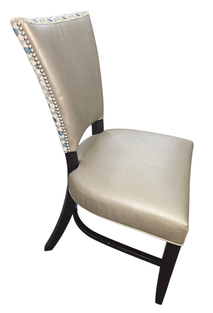 Used dining chair with nailhead trim in good condition