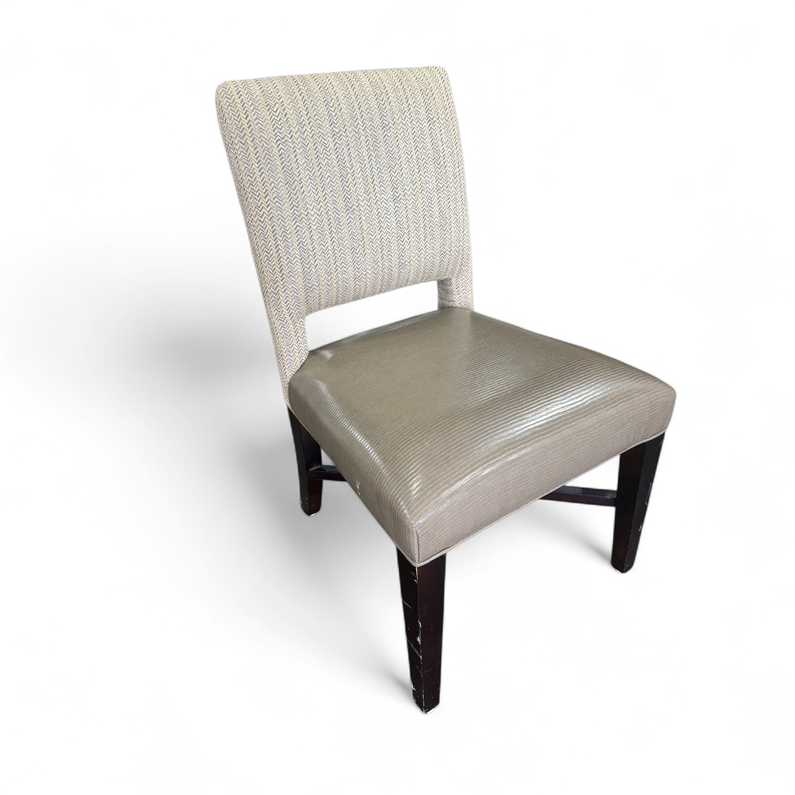 SHL angled view of beige dining chair in dining room setup, used and in good condition