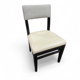 SHL front view of beige vinyl half-back dining chair measuring 18 x 18 x 19, used and in good condition