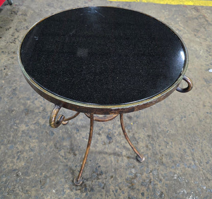 Close-up of black glass tabletop detail