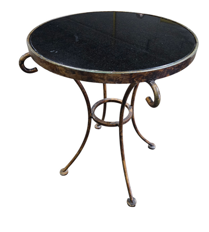 Black glass top side table with metal base measuring 18 inch diameter by 22.5 inch tall, used and in good condition
