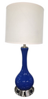 Blue glass table lamp with white drum shade and built in outlets, used and in good condition