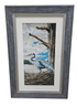 Framed wall art of blue heron standing in a large nest, used and in good condition