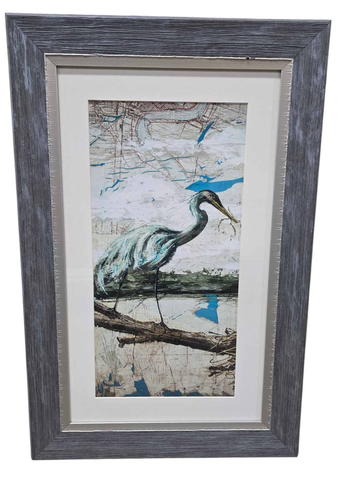 Framed wall art of blue heron on branch with vintage map background, used and in good condition