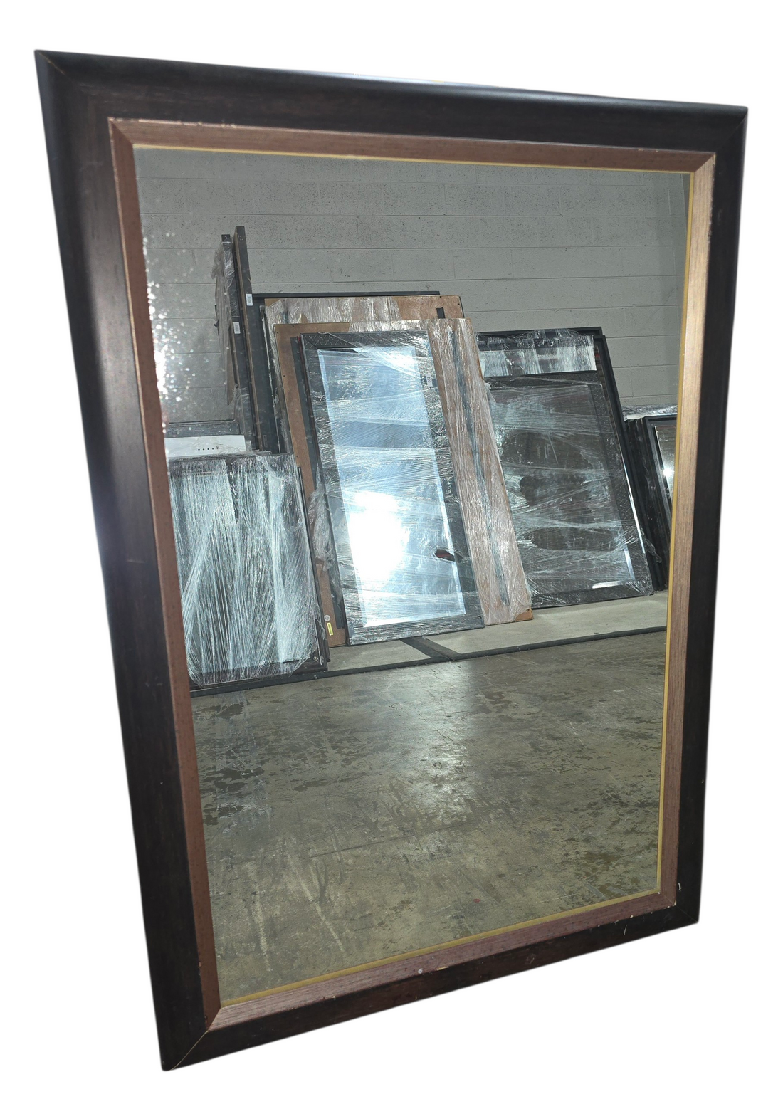 Wall mirror with dark brown frame and bronze trim 31 1/4 x 43 1/4 used in good condition