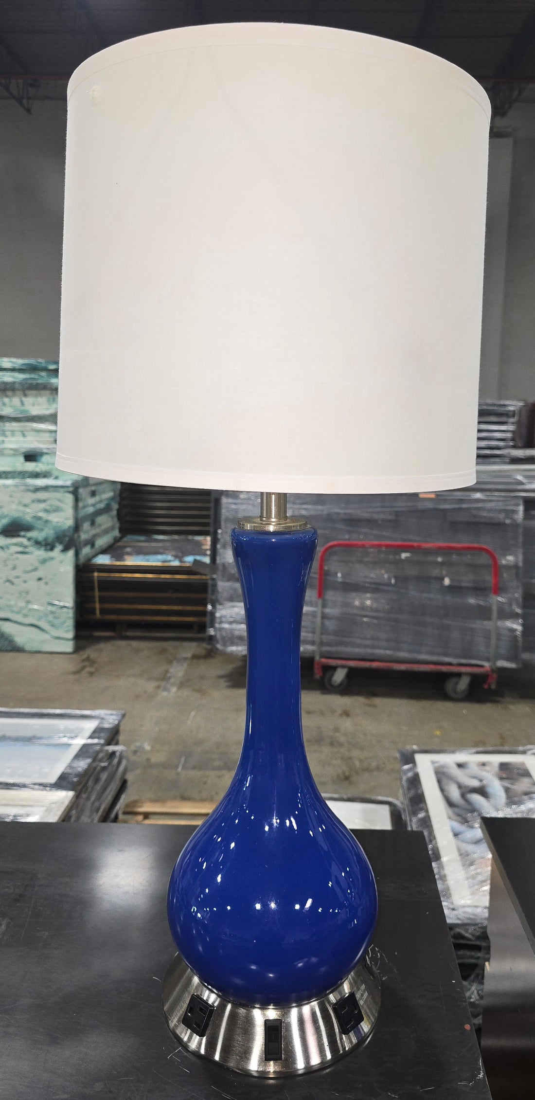 Close-up of metal base with outlets and switches