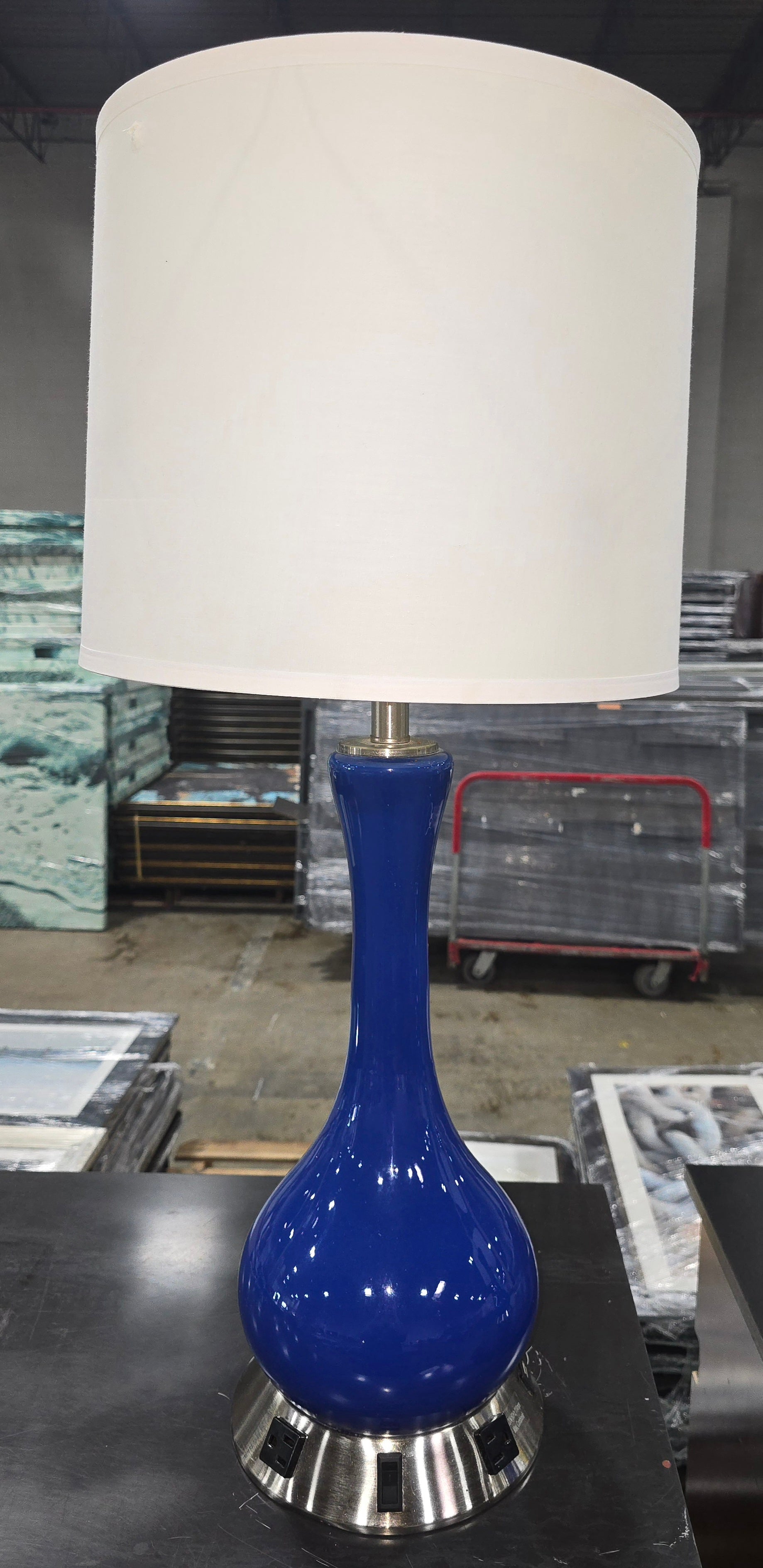 Close-up of metal base with outlets and switches