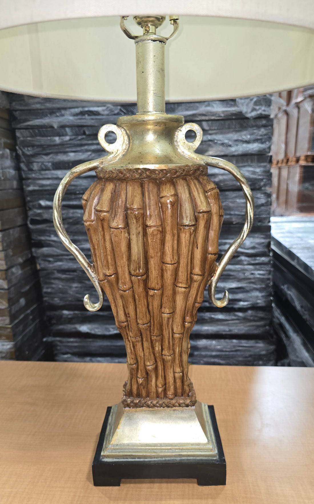 Detail view of faux bamboo stalk texture on bundle table lamp