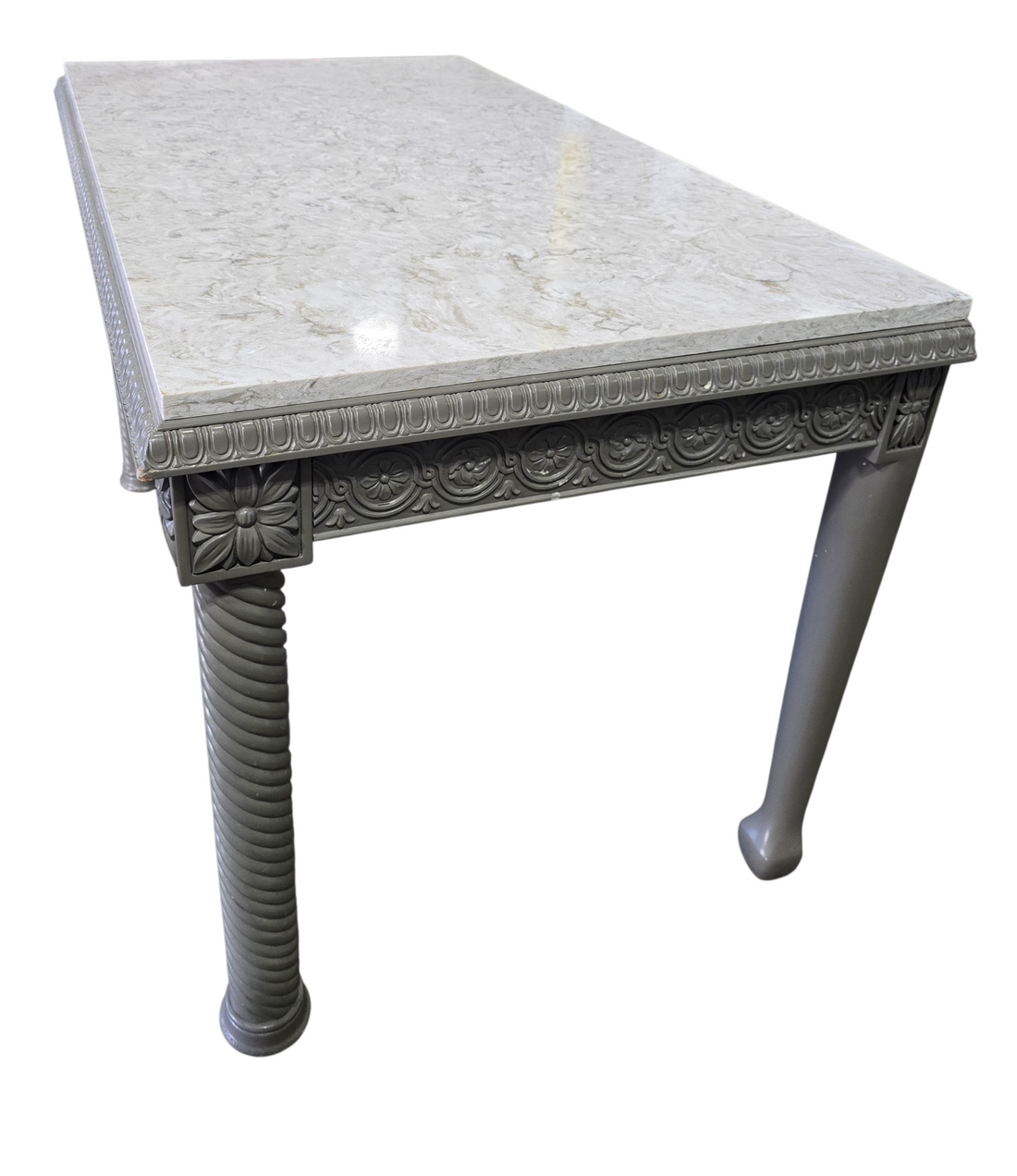 Side angle view of gray carved desk