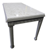 Side angle view of gray carved desk