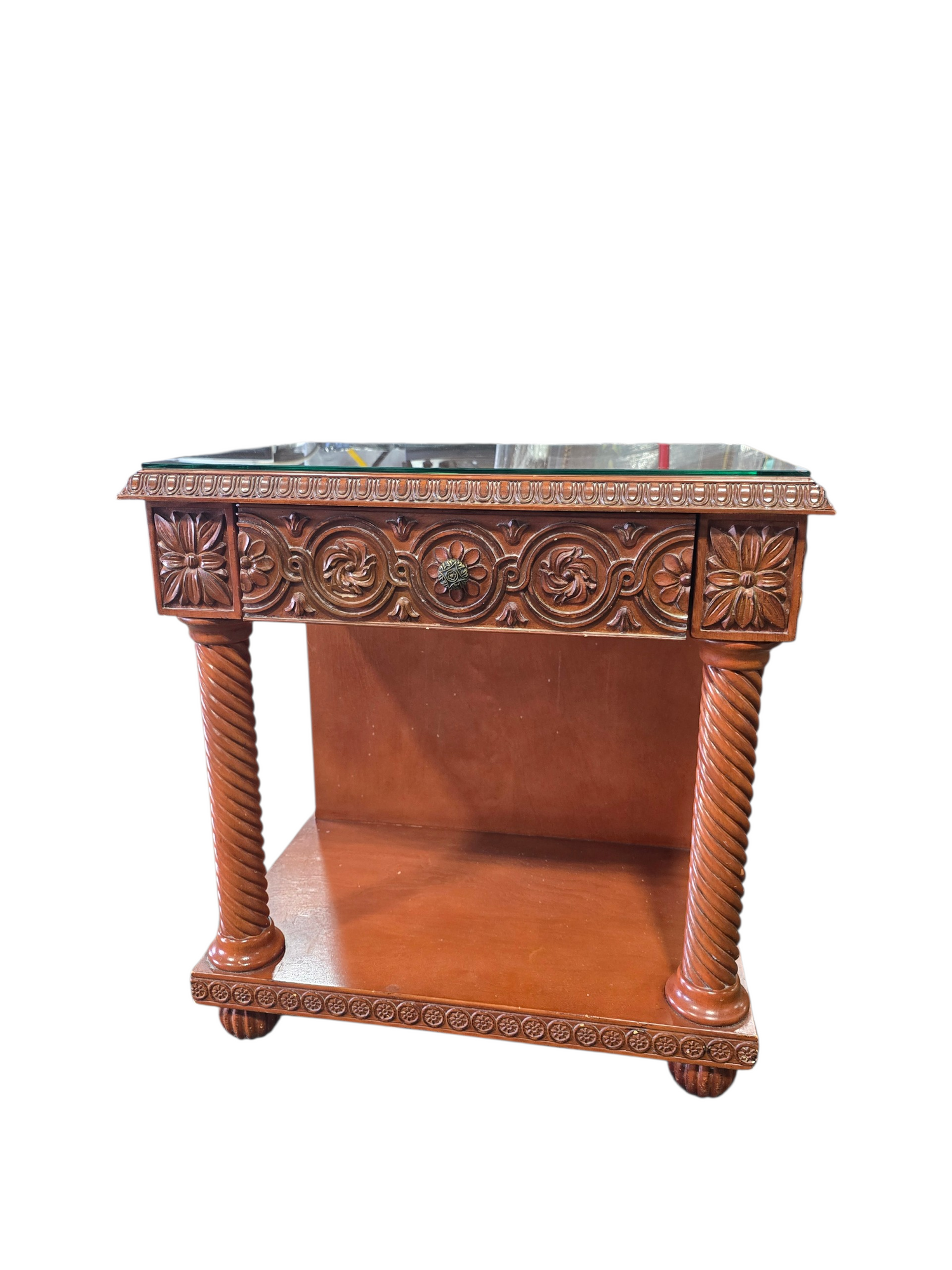 Front view of carved ornate nightstand with spiral legs