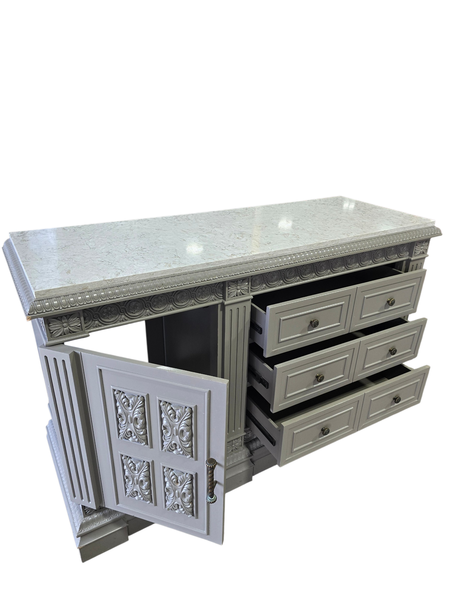 Carved wood TV dresser with white granite top and cabinet storage measuring 66 x 24 x 41, used and in good condition