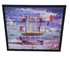 SHL framed coastal lifeguard tower wall art with colorful distressed beach design in black frame, 24 x 30 used in good condition