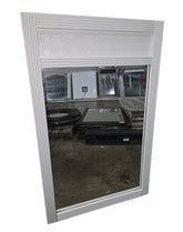 Coastal white shell motif wall mirror measuring 27.5 x 44 inches